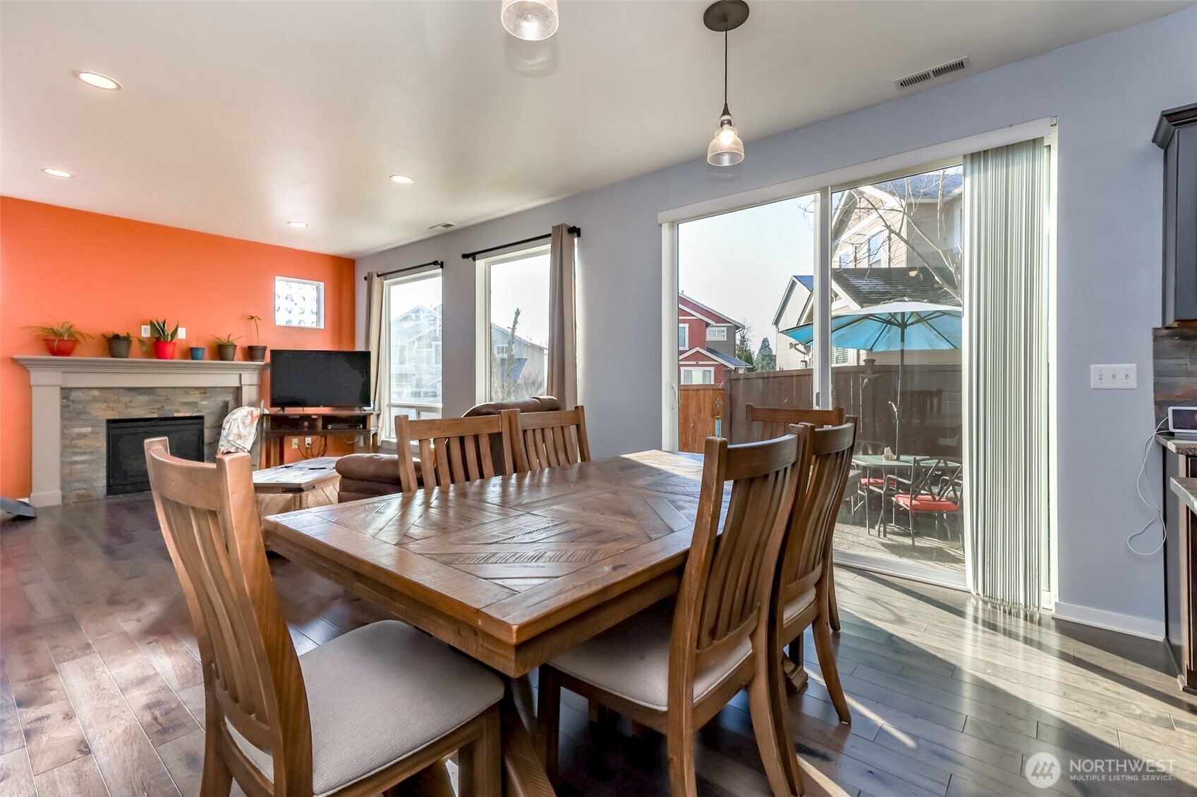 6820 9th Street East Fife, WA 98424 - Photo 11 of 40 a view of a dining room with furniture window and wooden floor
