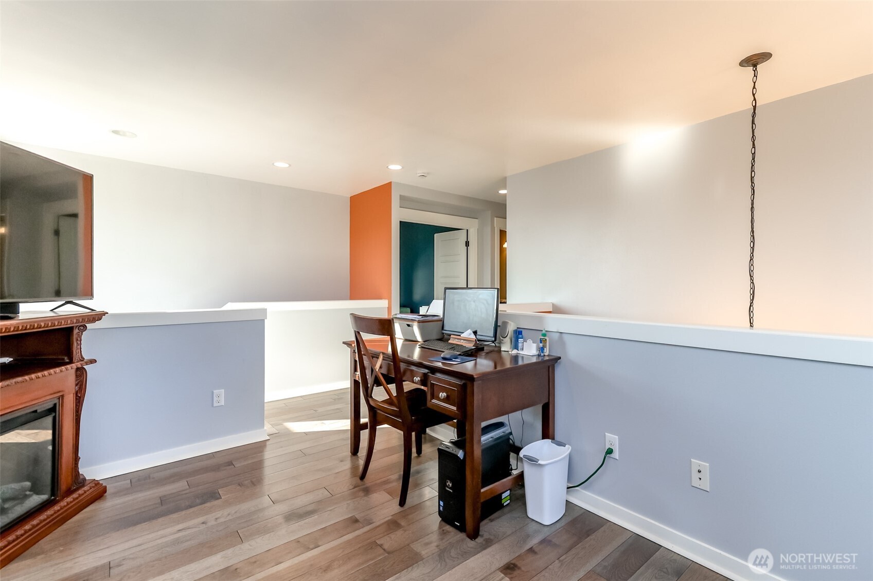6820 9th Street East Fife, WA 98424 - Photo 20 of 40 a view of a dining room with furniture and wooden floor