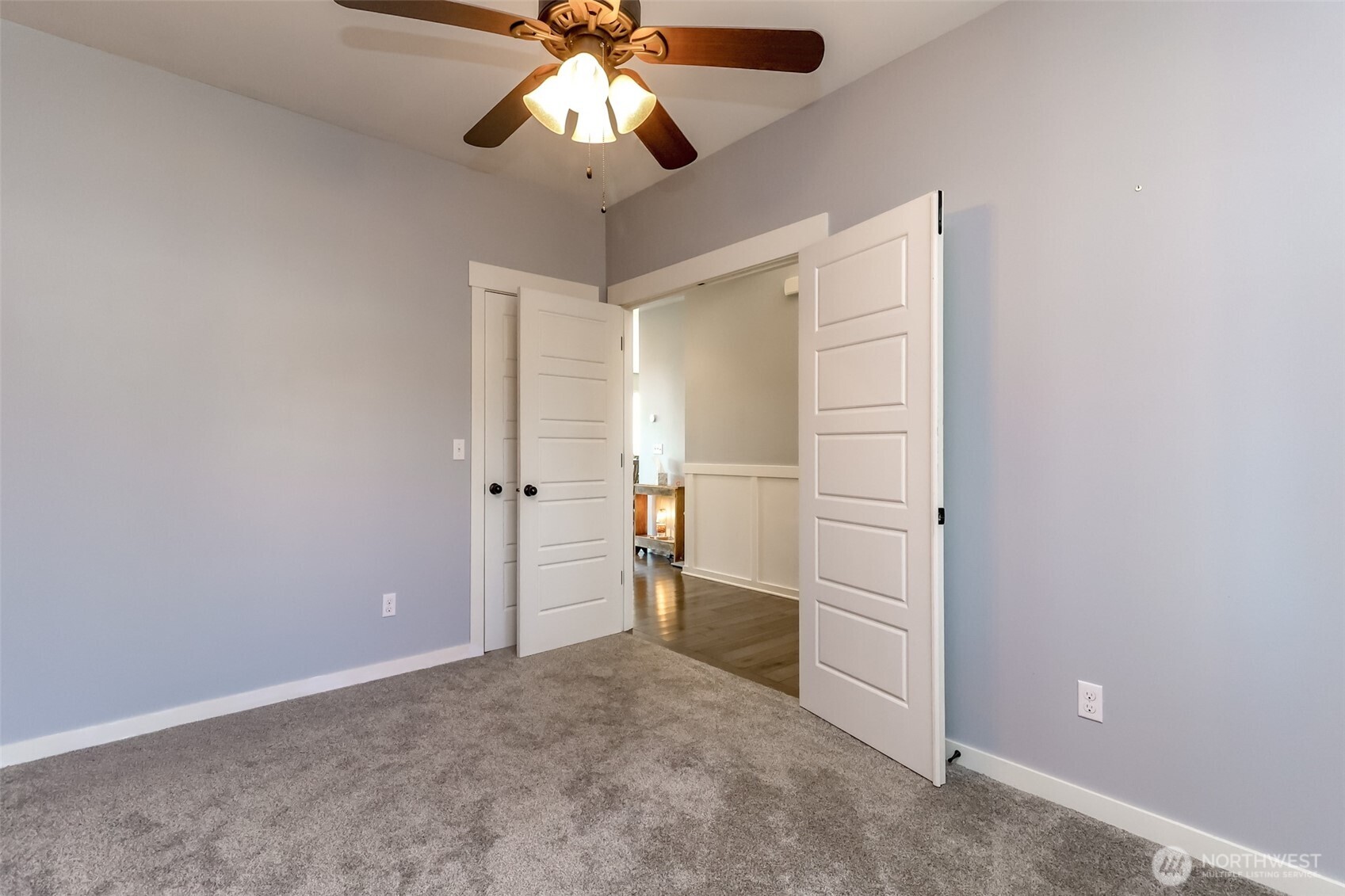6820 9th Street East Fife, WA 98424 - Photo 2 of 40 an empty room with closet and ceiling fan