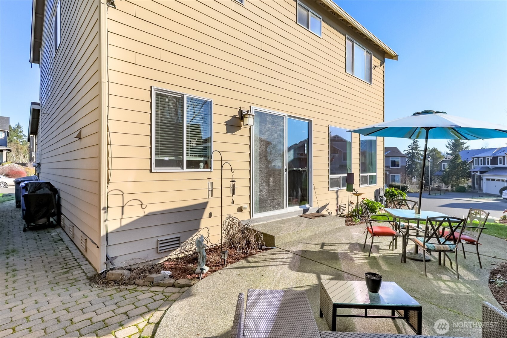 6820 9th Street East Fife, WA 98424 - Photo 29 of 40 a view of a house with backyard and sitting area