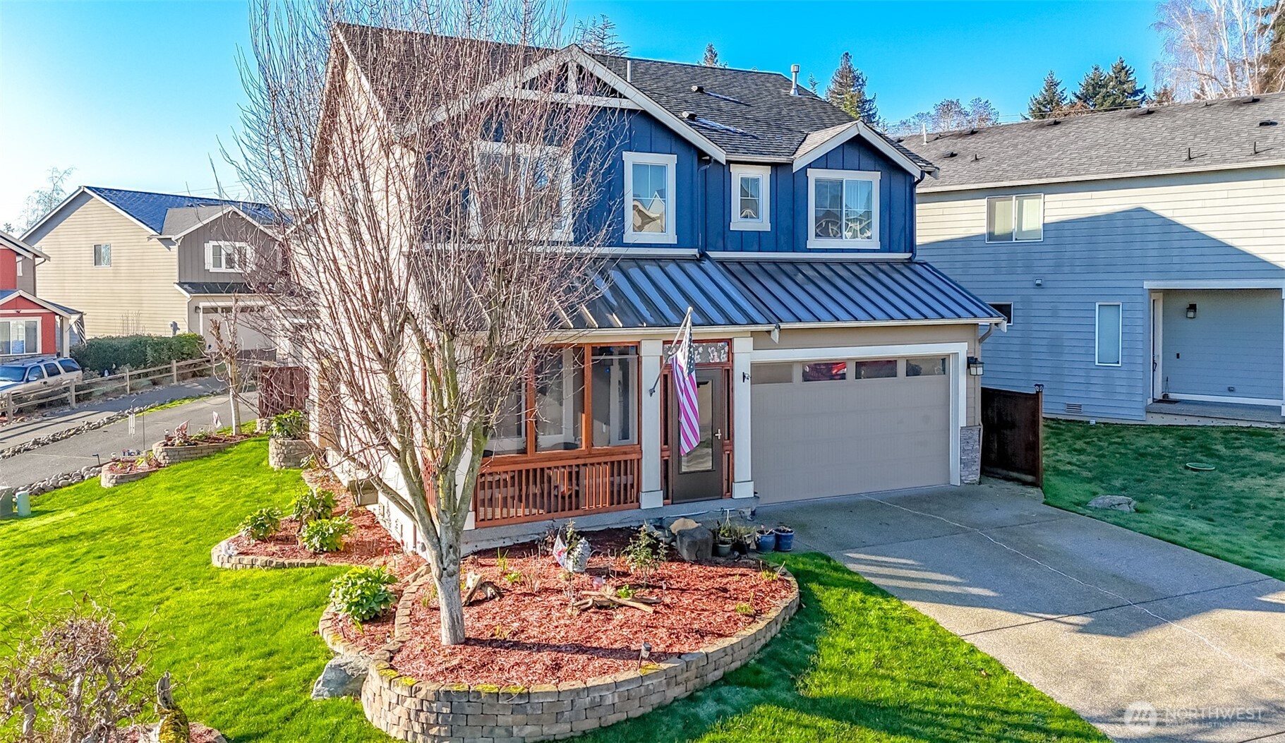 6820 9th Street East Fife, WA 98424 - Photo 31 of 40 a view of a house with pool and garden