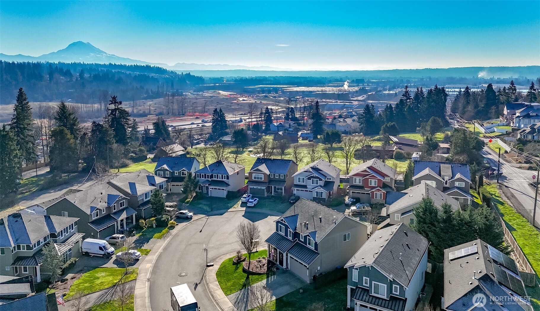 6820 9th Street East Fife, WA 98424 - Photo 35 of 40 an aerial view of a house with swimming pool and outdoor space