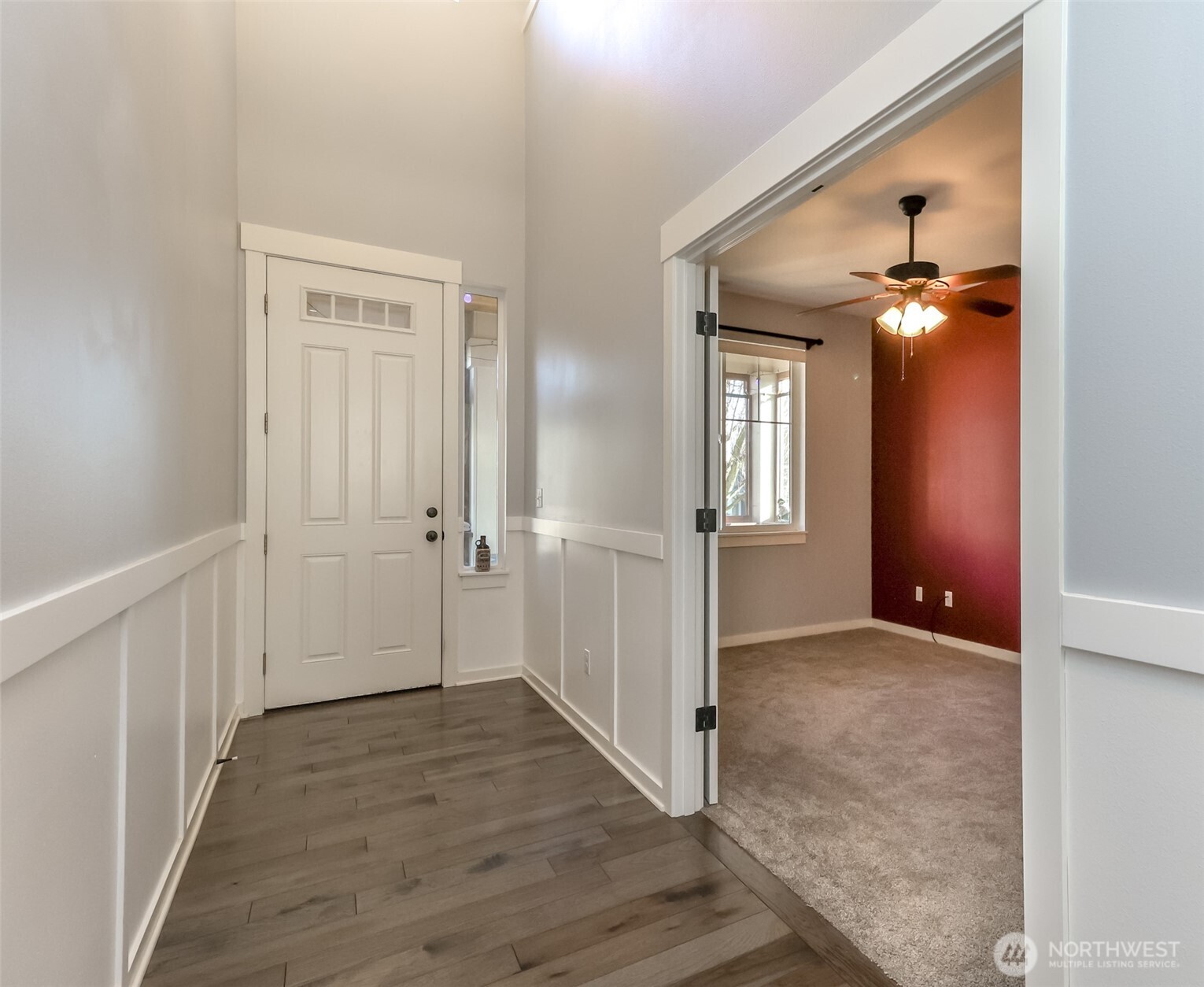 6820 9th Street East Fife, WA 98424 - Photo 5 of 40 wooden floor in an empty room with a window