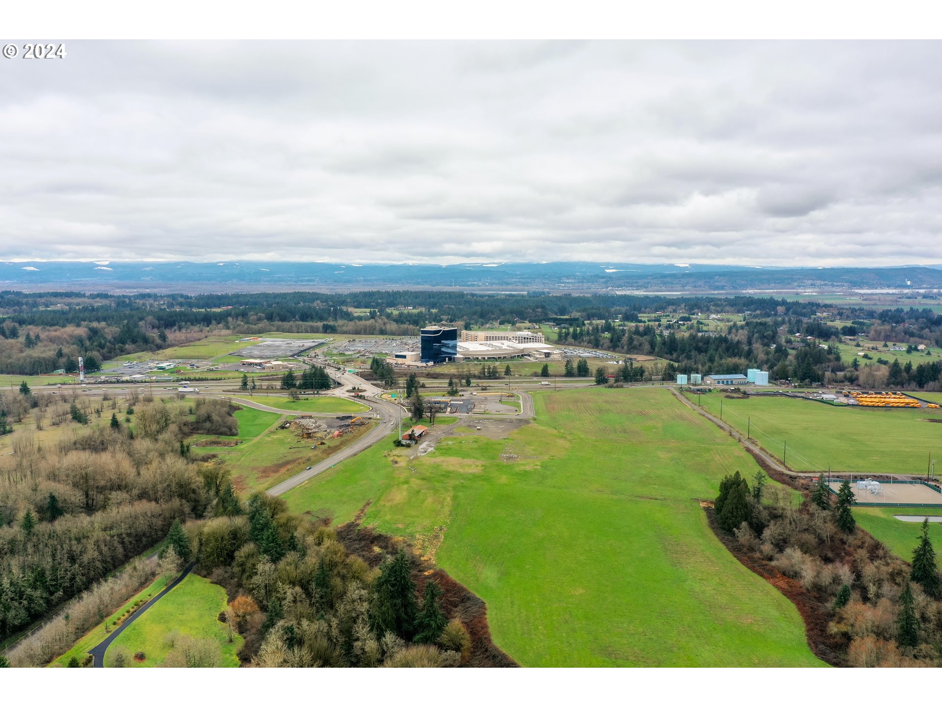 18th Avenue Ridgefield, WA 98642 - Photo 3 of 4 a view of a lake with a city