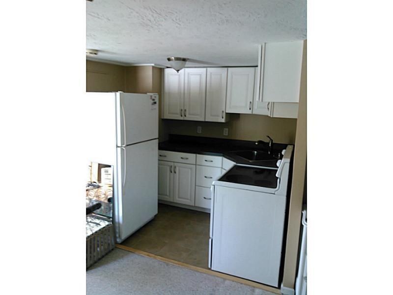 2090 Post Road, Unit 7B Wells, ME 04090 - Photo 3 of 18 Kitchen. Tiled floors and new appliances