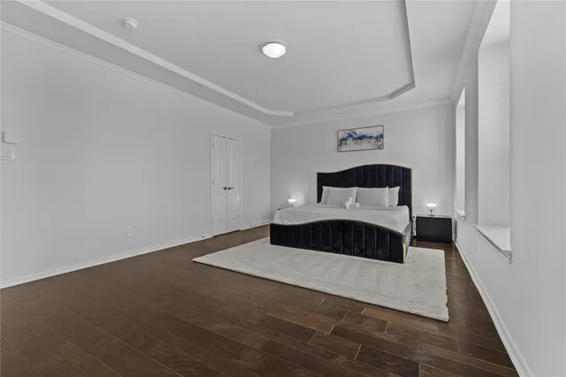 a living room with furniture a rug a fireplace and a table