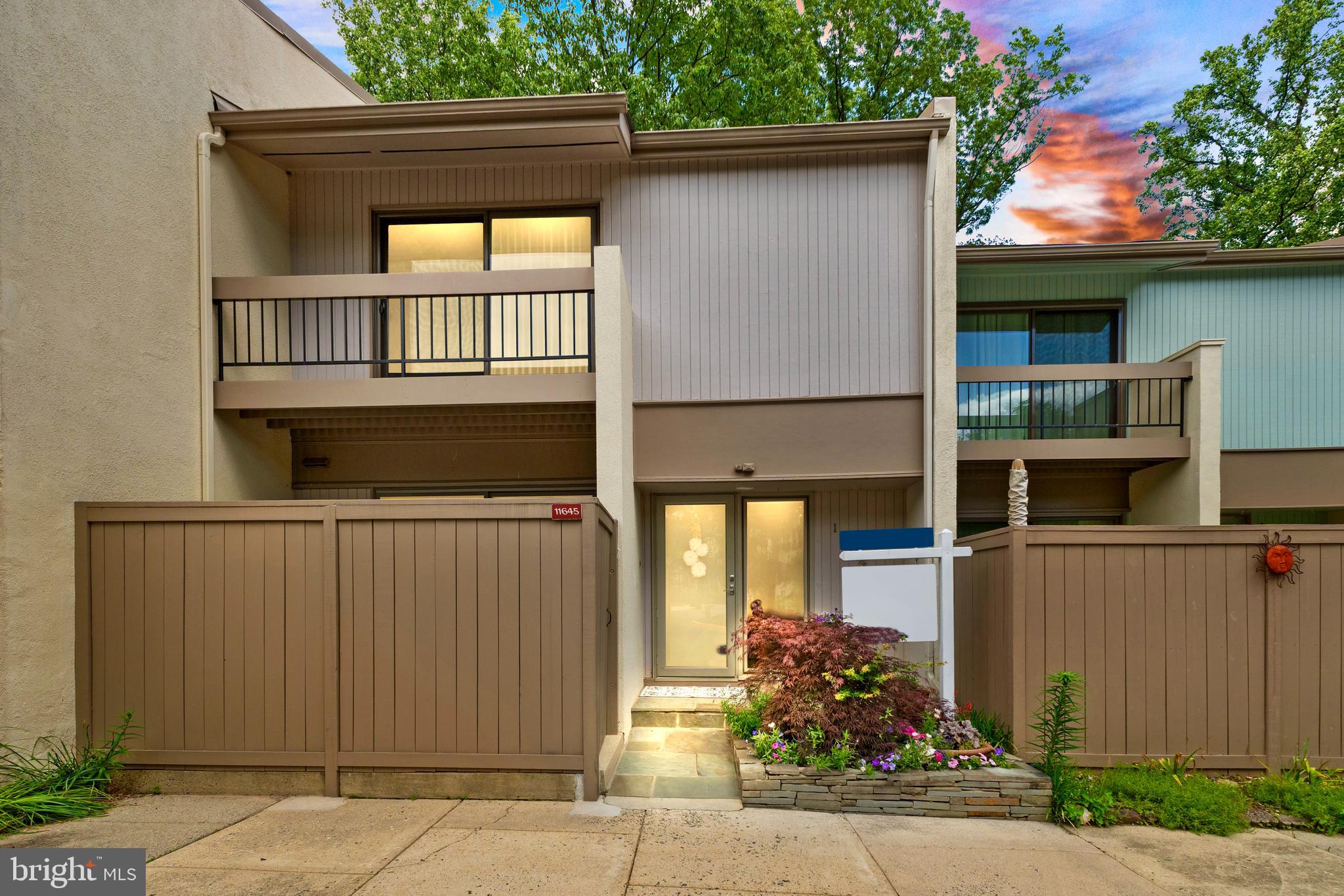 11645 Newbridge Court Reston, VA 20191 - Photo 1 of 62 front view of a house with a window