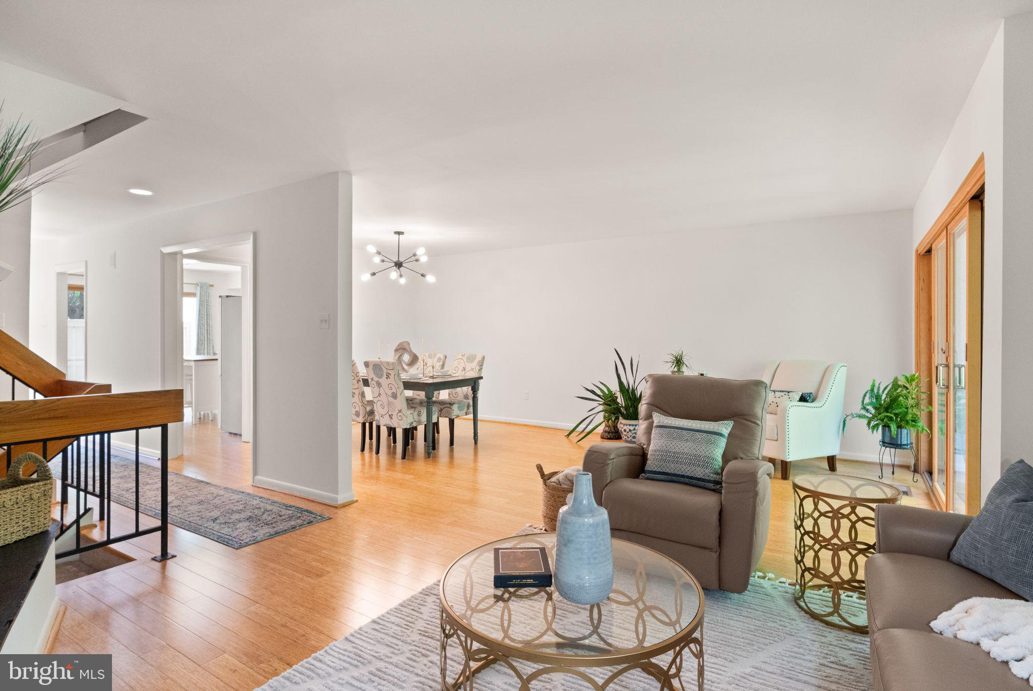 11645 Newbridge Court Reston, VA 20191 - Photo 22 of 62 a living room with furniture and a wooden floor