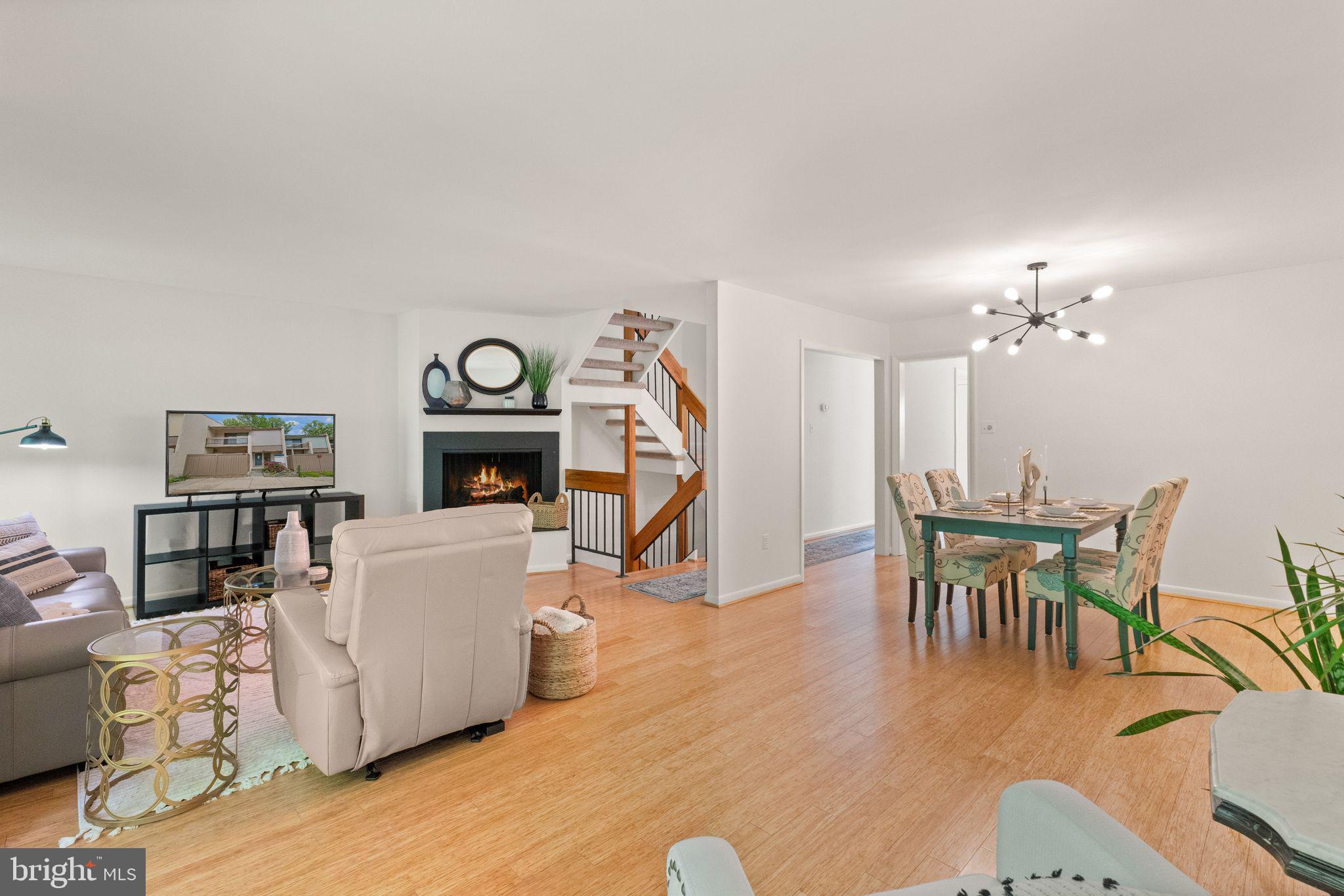 11645 Newbridge Court Reston, VA 20191 - Photo 27 of 62 a view of a livingroom with furniture and a table