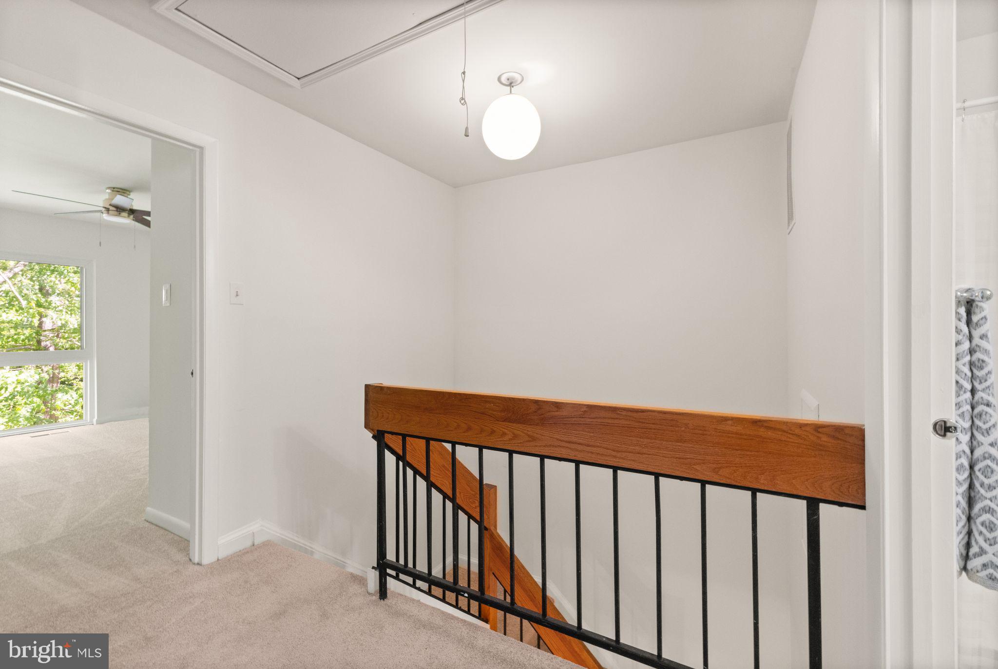 11645 Newbridge Court Reston, VA 20191 - Photo 35 of 62 a view of a hallway with a window