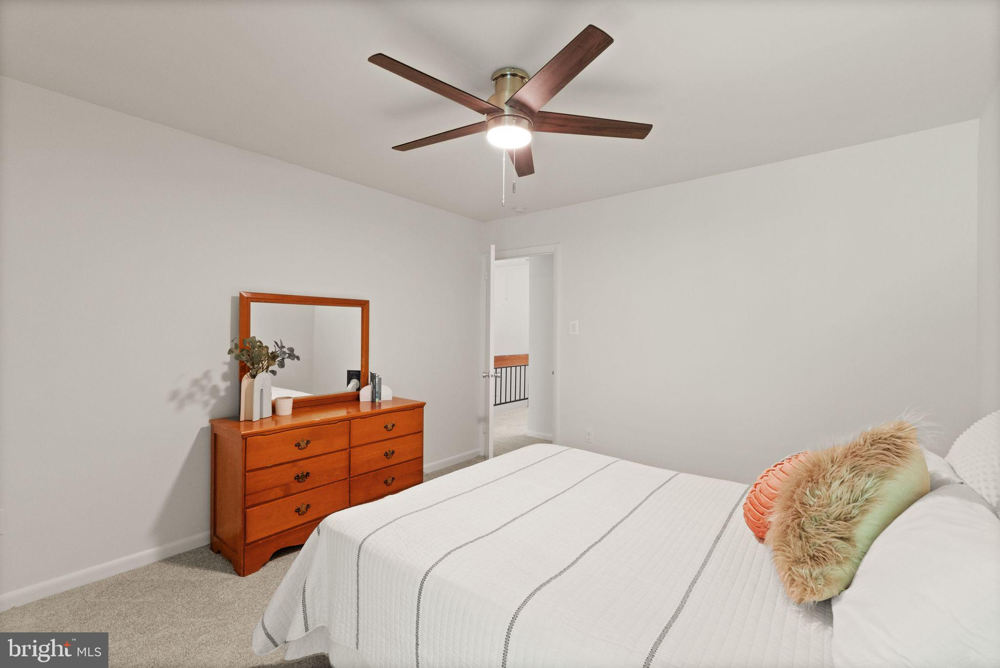 11645 Newbridge Court Reston, VA 20191 - Photo 48 of 62 a bedroom with bed and window