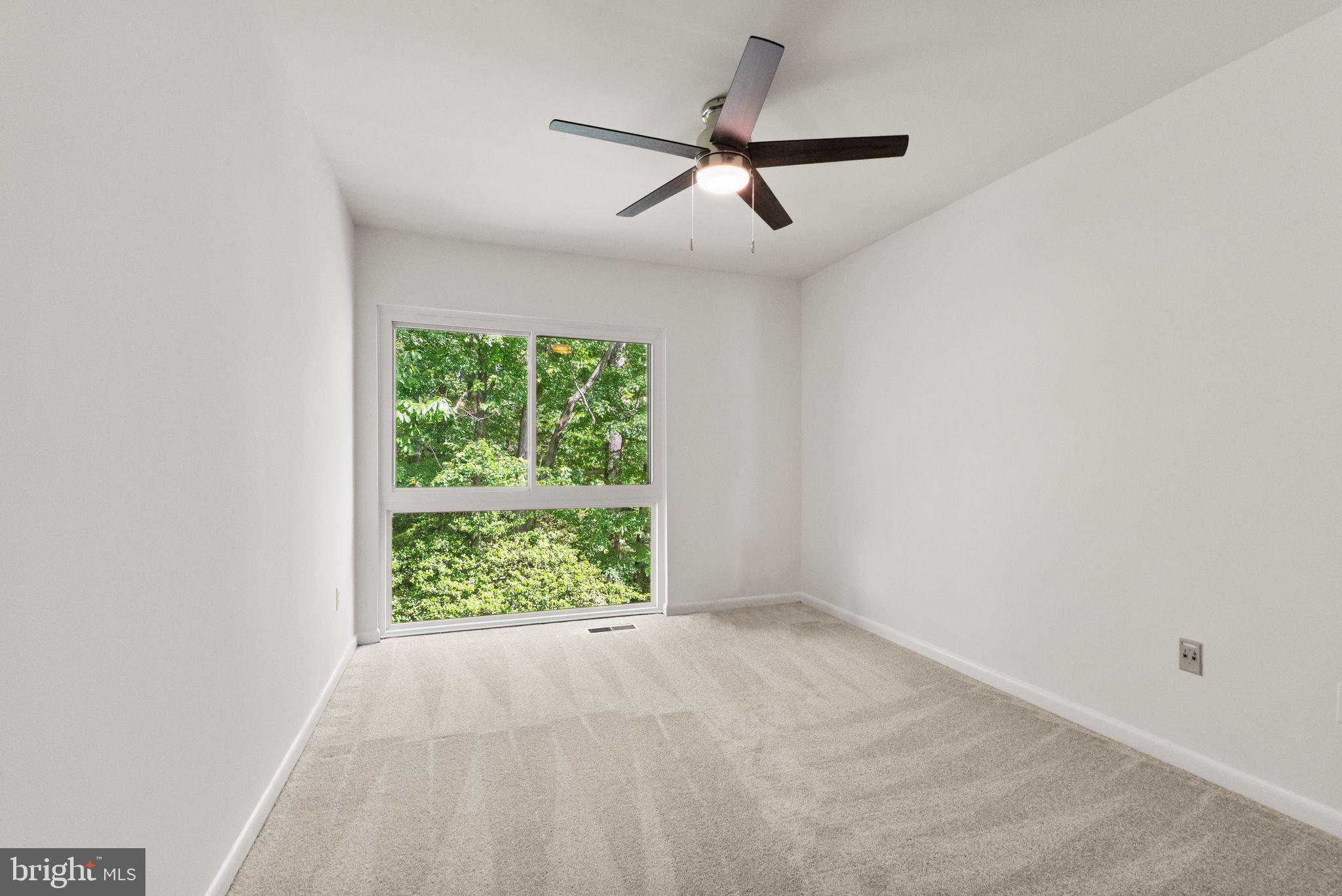 11645 Newbridge Court Reston, VA 20191 - Photo 49 of 62 an empty room with a window