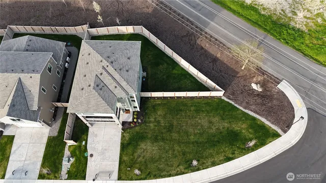 a view of a house with a sink and backyard