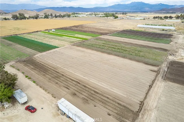 a view of a car parked in back of a house
