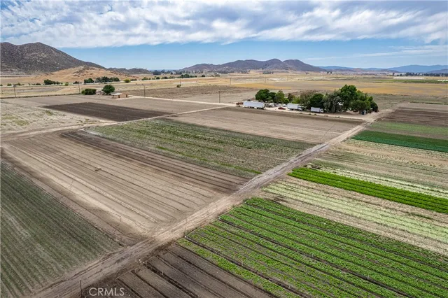 a view of an ocean and a mountain
