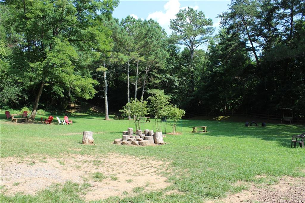 0 Denny Ridge Road Jasper, GA 30143 - Photo 29 of 44 a green field with lots of trees in it