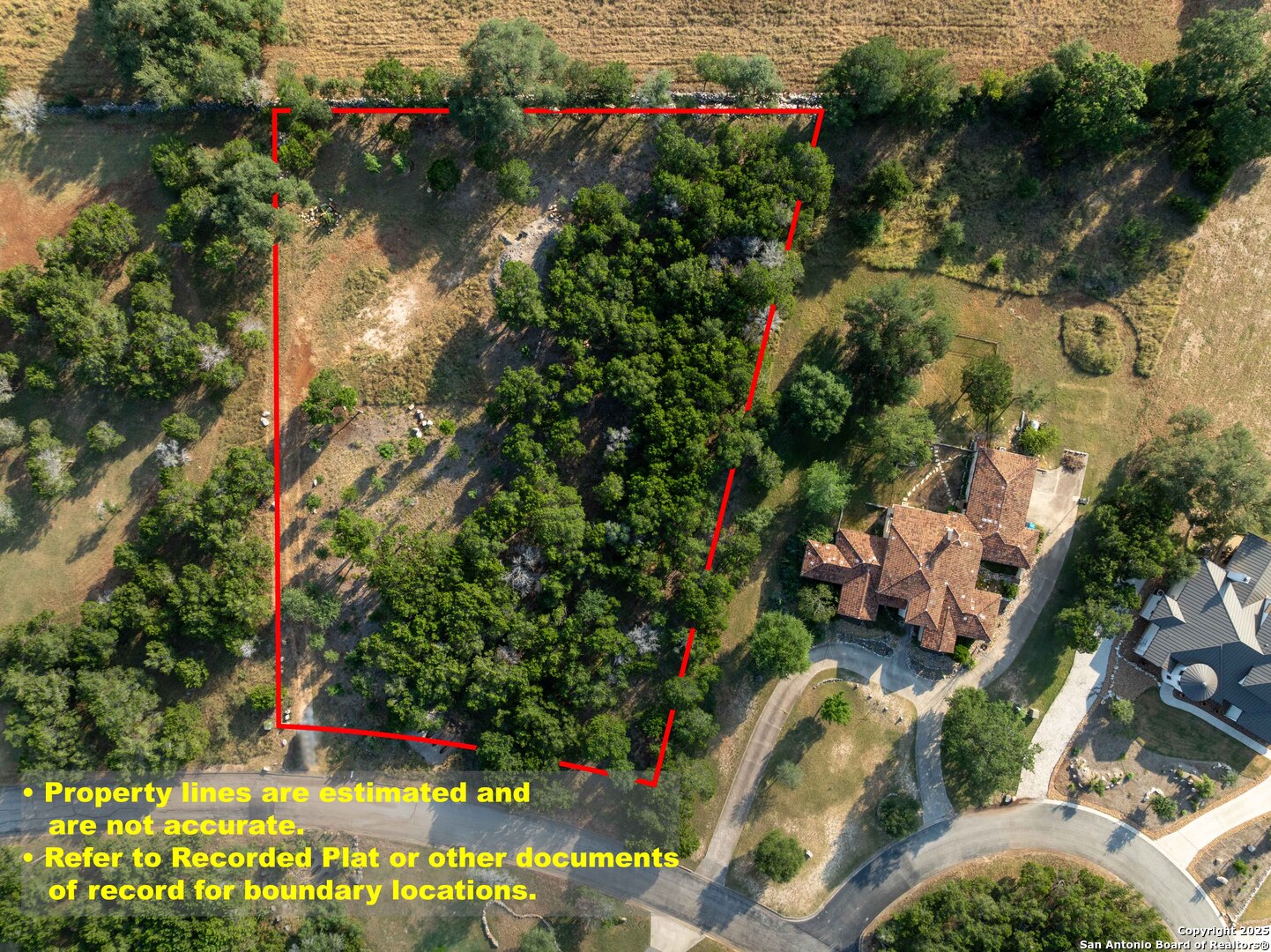 27919 Bogen Road New Braunfels, TX 78132 - Photo 3 of 23 an aerial view of residential houses with outdoor space and trees all around