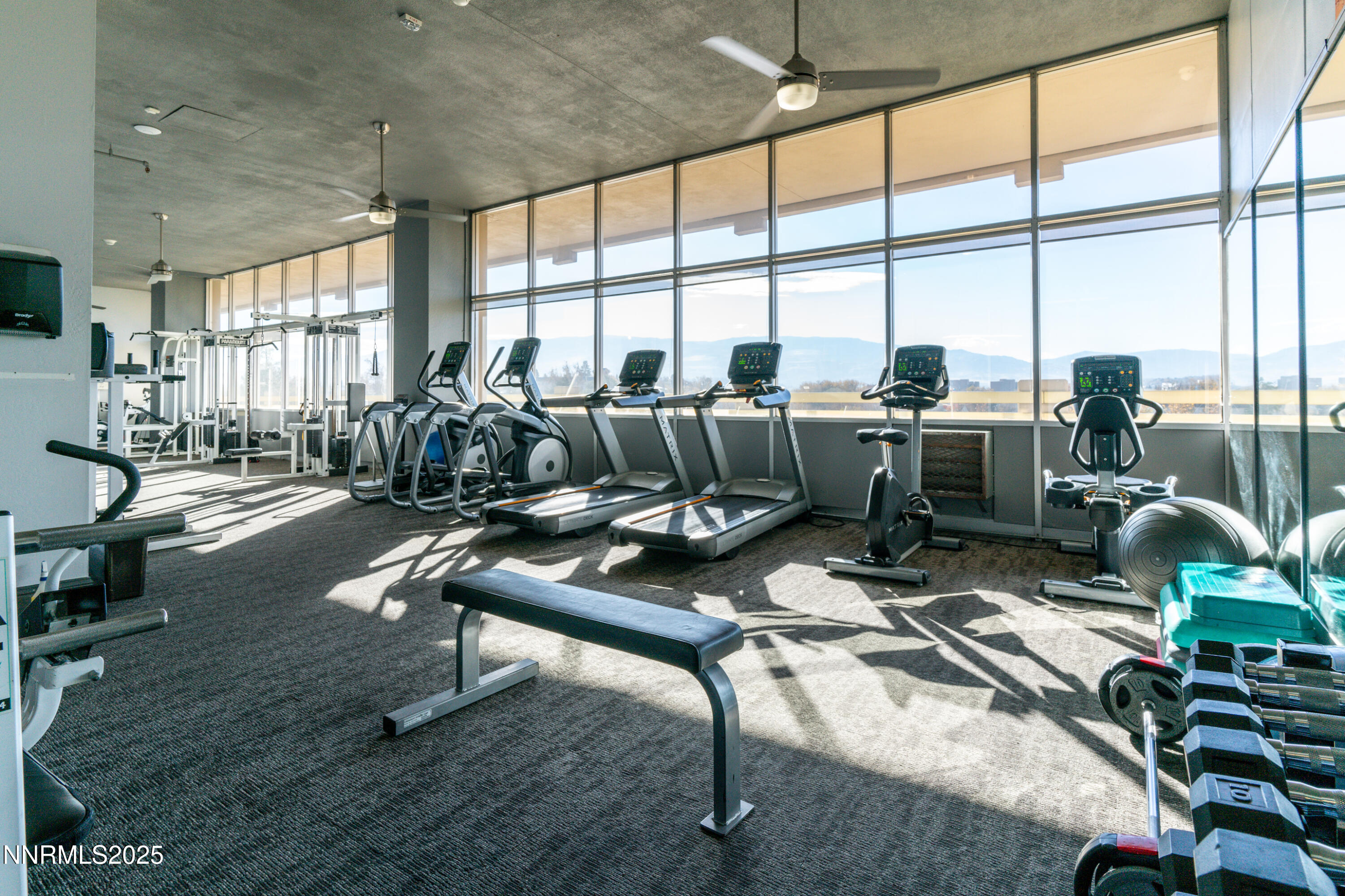 100 North Arlington Avenue, Unit 7I Reno, NV 89501 - Photo 15 of 25 a living room with furniture city view and large windows