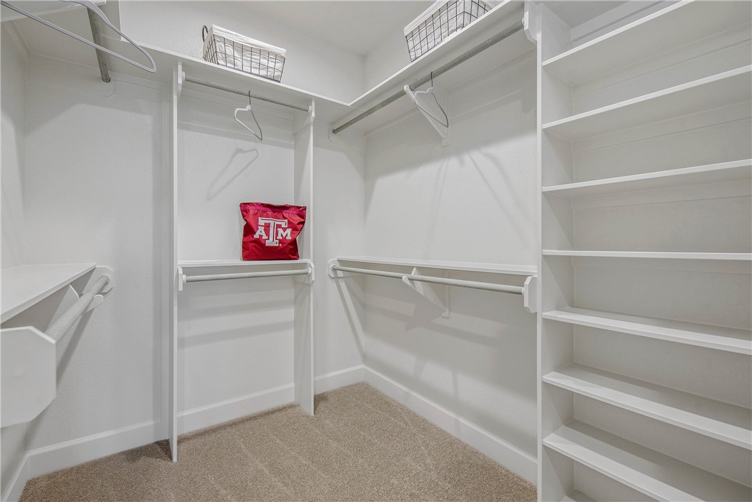 5010 Acadia Loop Bryan, TX 77802 - Photo 20 of 21 a view of an empty walk in closet