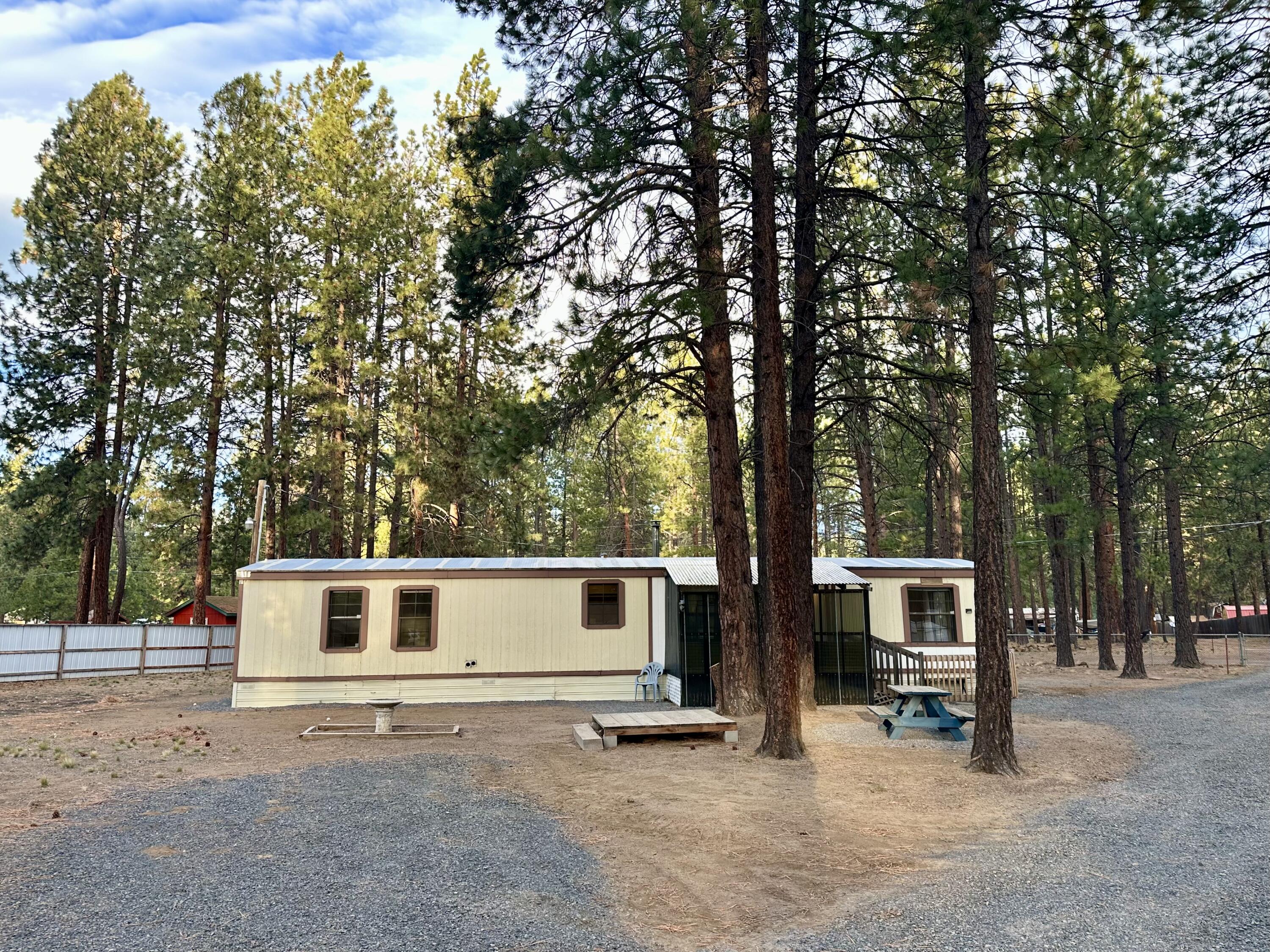 60083 Navajo Road Bend, OR 97702 - Photo 2 of 20 Your woodsy retreat on a flat, usable lot!