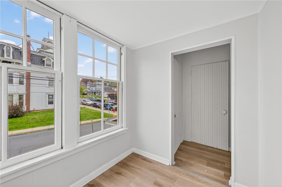 65 2nd Street Slatington, PA 18080 - Photo 39 of 46 This bright space offers lovely views through multiple grid windows, complementing its smooth wood-look flooring.