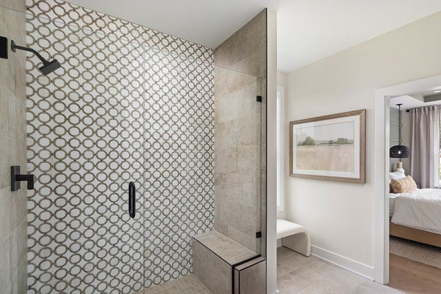 a bathroom with a shower curtain