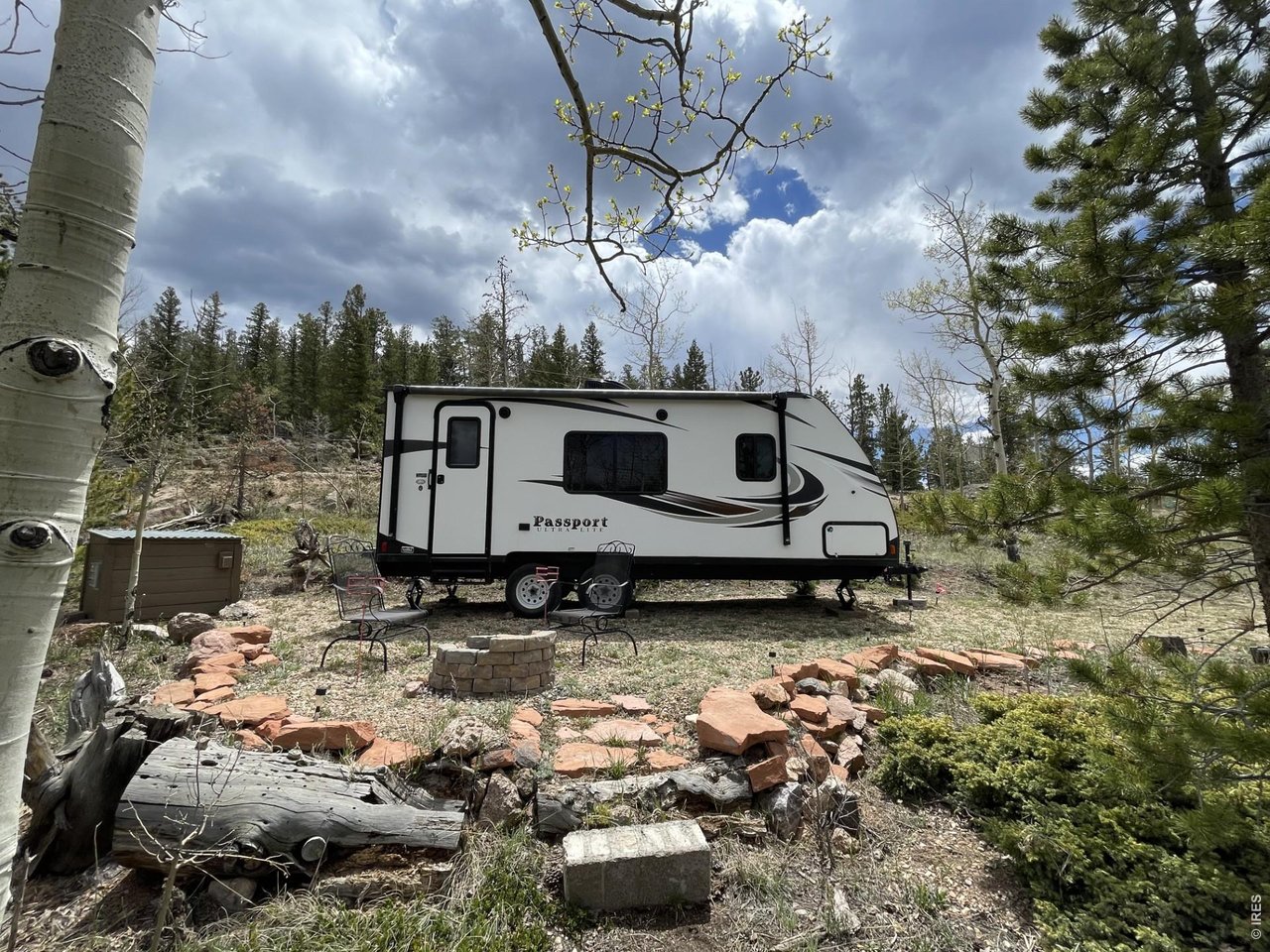 22 Tami Road Red Feather Lakes, CO 80545 - Photo 22 of 33 2018 Keystone Passport Camper is also available for purchase separately.