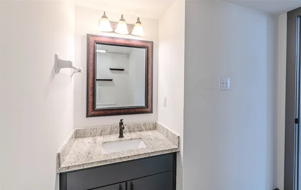 a view of a hallway with staircase