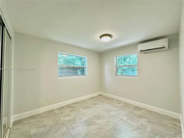 an empty room with a window