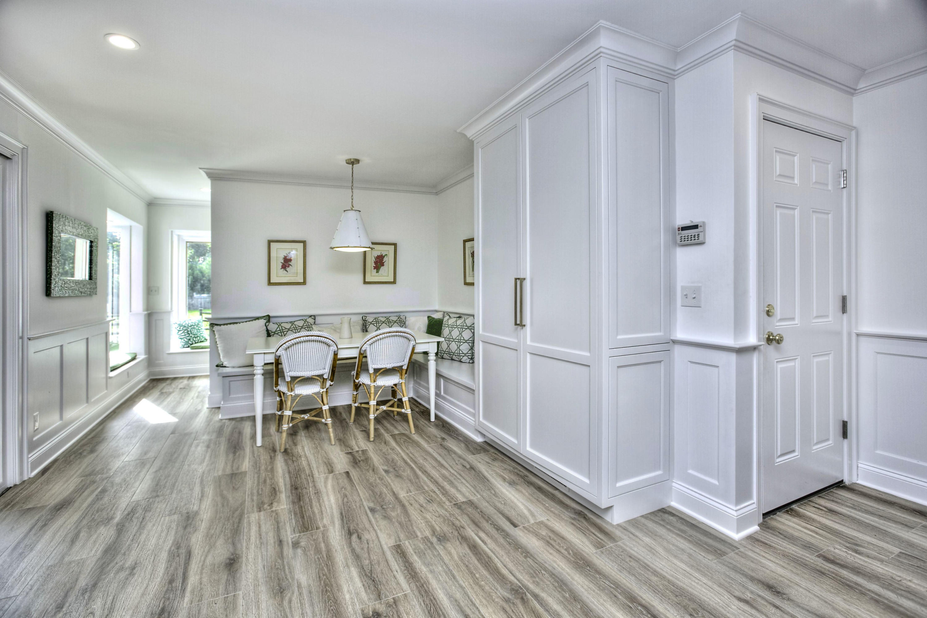176 White Oak Shade Road New Canaan, CT 06840 - Photo 12 of 33 a view of a dining room with furniture and wooden floor