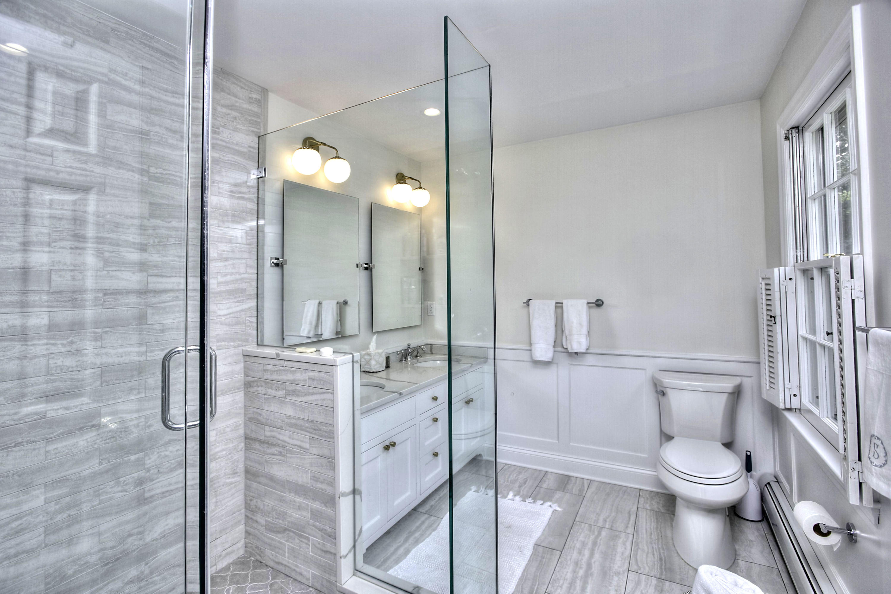 176 White Oak Shade Road New Canaan, CT 06840 - Photo 18 of 33 a bathroom with a toilet a sink and shower