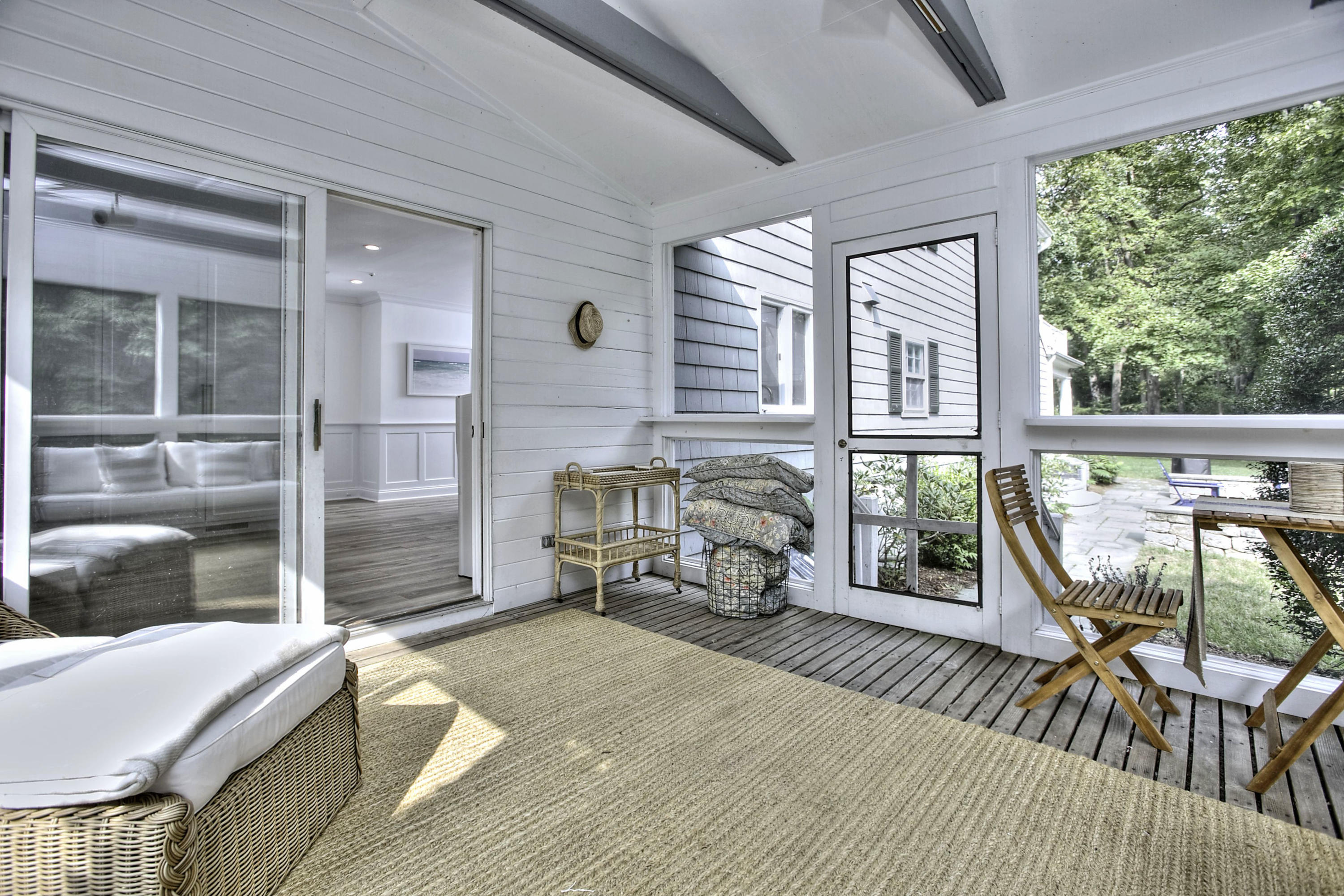176 White Oak Shade Road New Canaan, CT 06840 - Photo 26 of 33 a bedroom with furniture and a large window