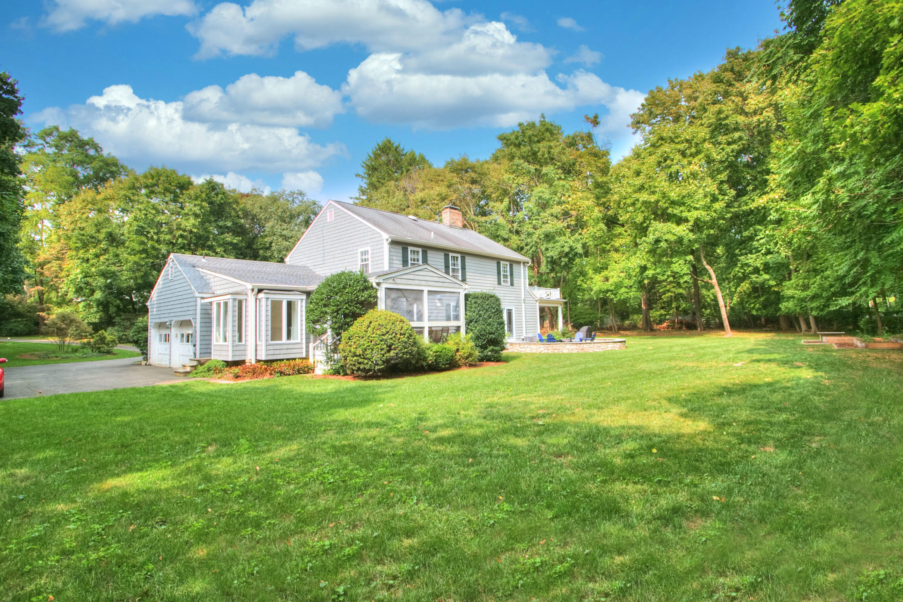 176 White Oak Shade Road New Canaan, CT 06840 - Photo 30 of 33 a view of a house with a big yard plants and large trees