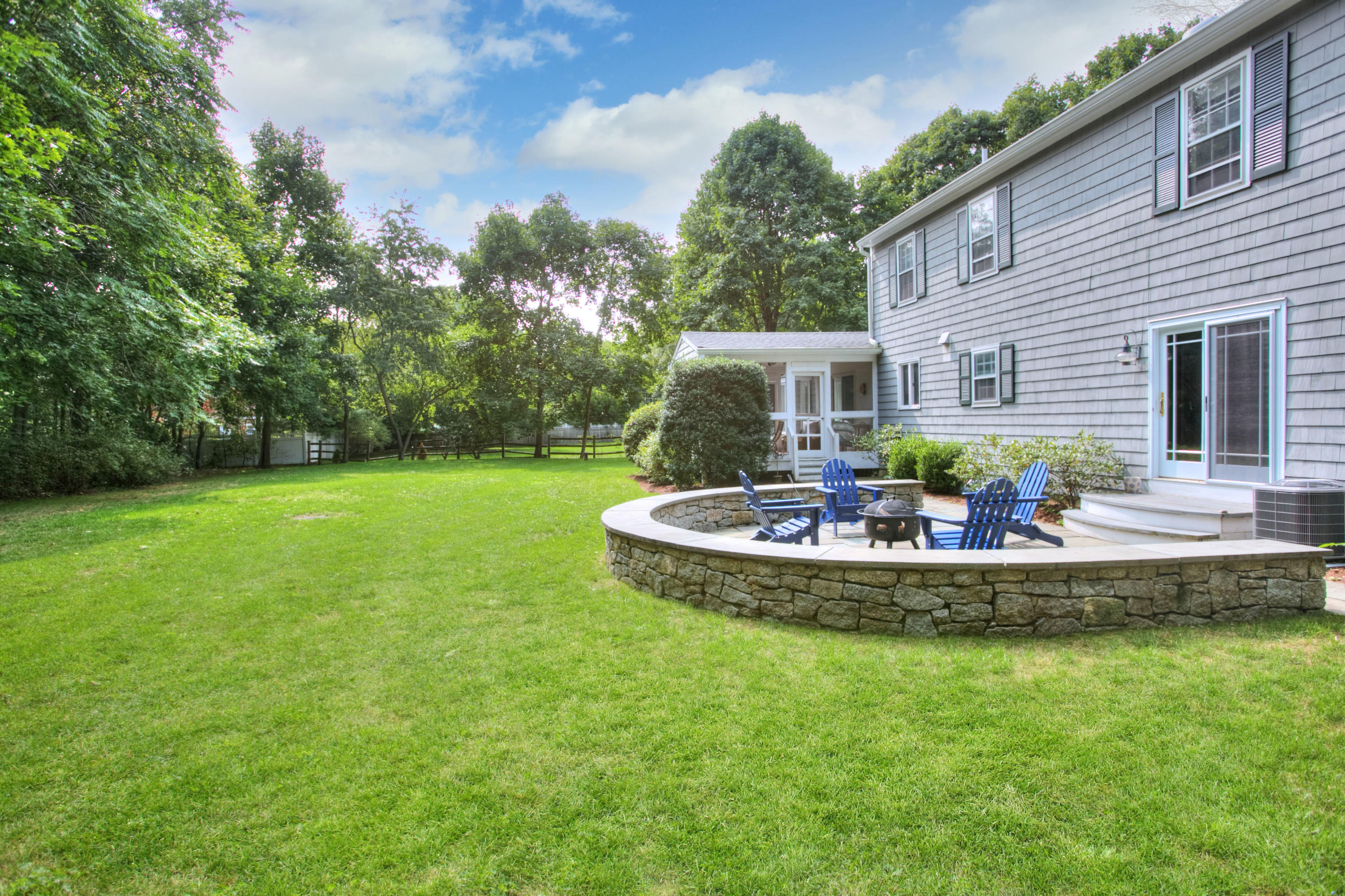 176 White Oak Shade Road New Canaan, CT 06840 - Photo 32 of 33 a view of a house with swimming pool and a garden