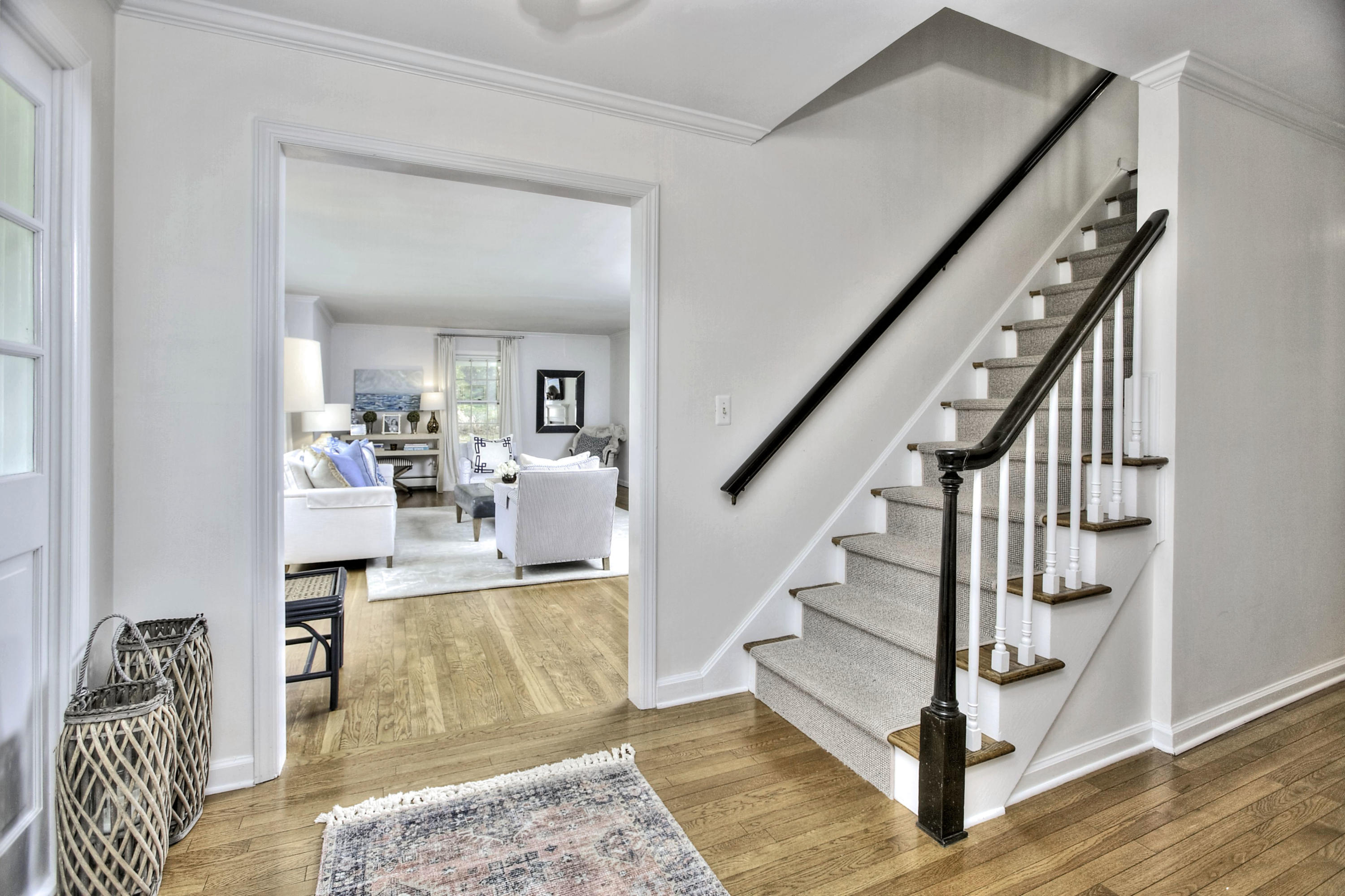 176 White Oak Shade Road New Canaan, CT 06840 - Photo 7 of 33 a living room with furniture and a wooden floor