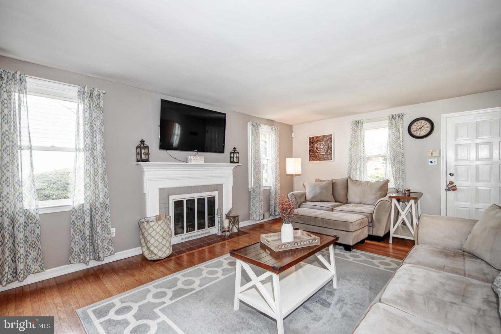 54 Fairhill Road Morton, PA 19070 - Photo 4 of 21 Living Room w/ Wood Burning Fireplace