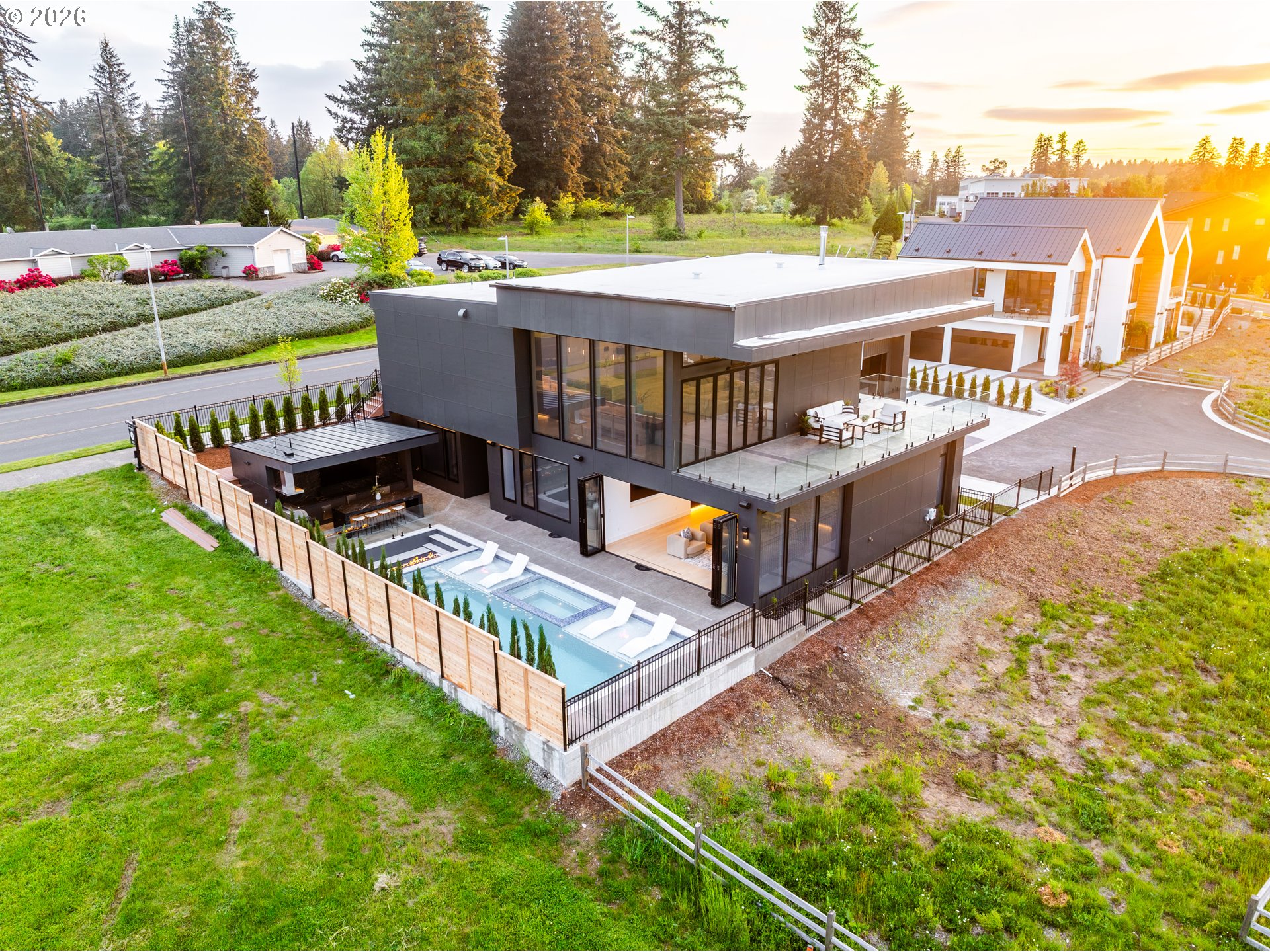 4541 Northwest 71st Avenue Camas, WA 98607 - Photo 4 of 48 an aerial view of a house with a big yard and large trees