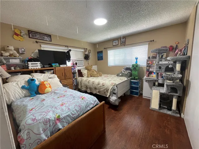 a bathroom with a sink vanity mirror and toilet