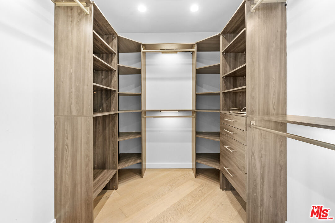 30 Voyage Street Marina del Rey, CA 90292 - Photo 11 of 21 a view of walk in closet with empty racks