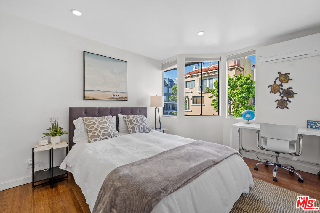 30 Voyage Street Marina del Rey, CA 90292 - Photo 12 of 21 a bedroom with a bed and a table