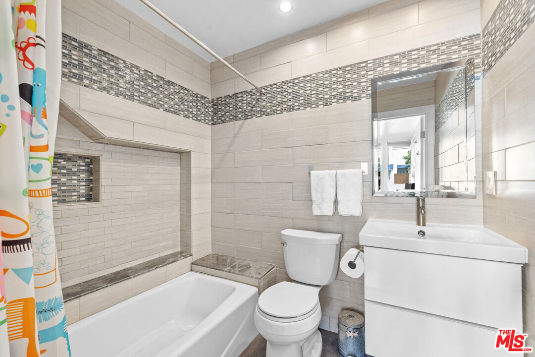 30 Voyage Street Marina del Rey, CA 90292 - Photo 14 of 21 a bathroom with a sink a toilet and shower