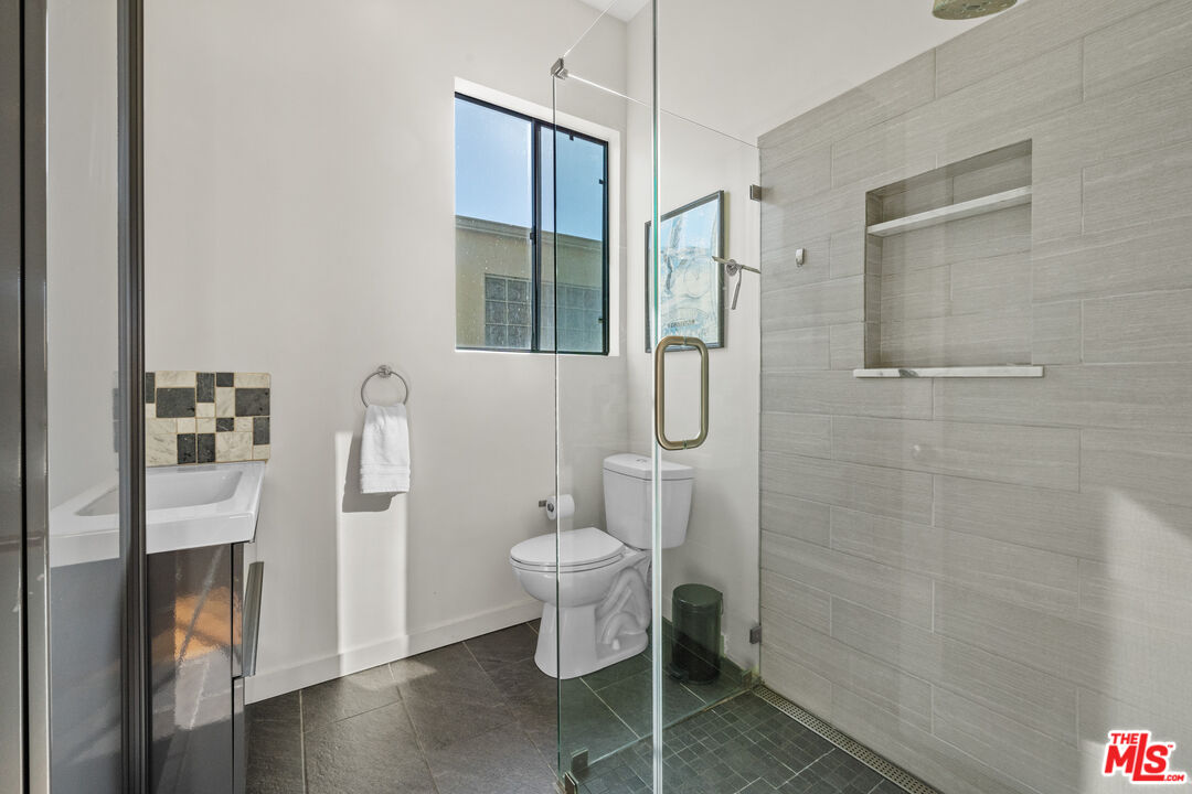 30 Voyage Street Marina del Rey, CA 90292 - Photo 17 of 21 a bathroom with a toilet and a shower