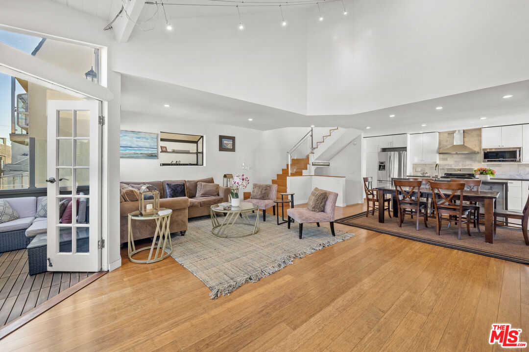 30 Voyage Street Marina del Rey, CA 90292 - Photo 3 of 21 a living room with lots of furniture and kitchen view