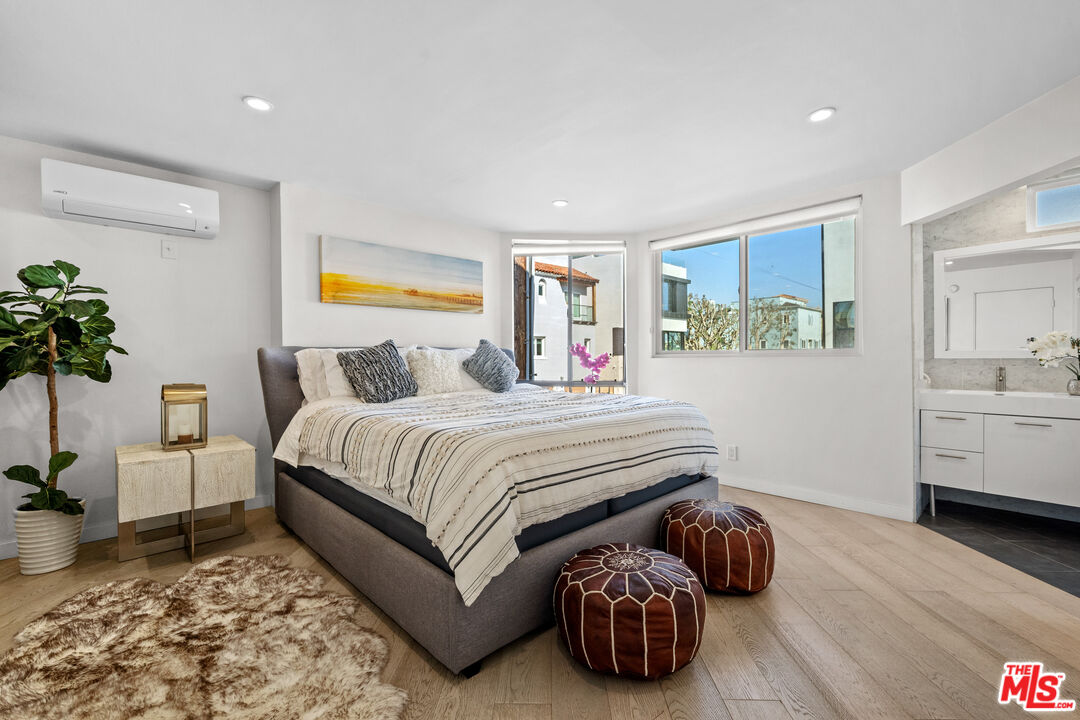 30 Voyage Street Marina del Rey, CA 90292 - Photo 7 of 21 a bedroom with a bed and a couch