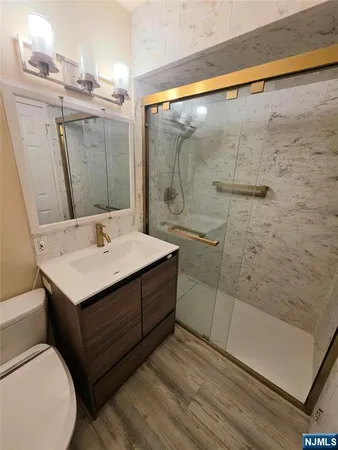 a bathroom with a sink and mirror