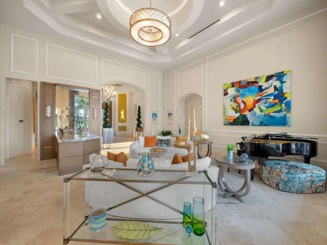 a living room with furniture and a table