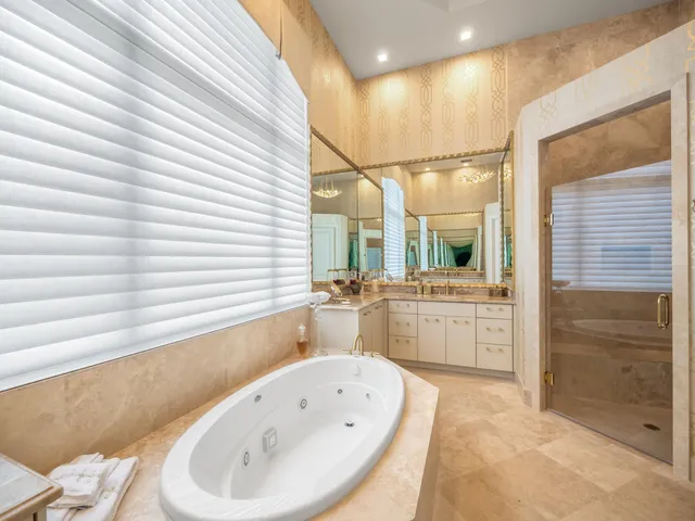 a bathroom with a bathtub and a sink