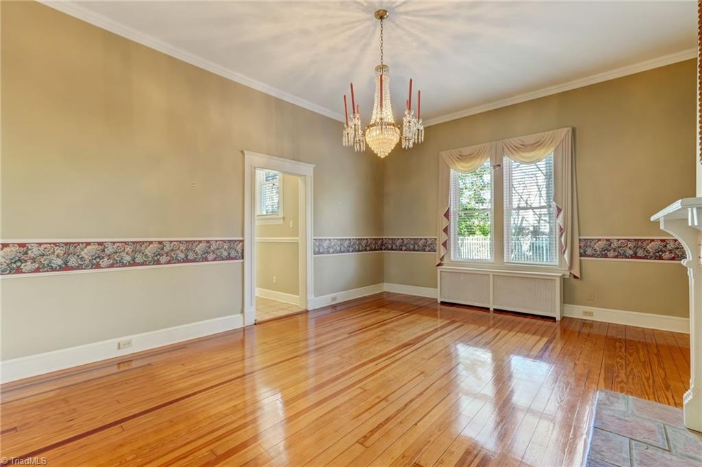 521 Patrick Street Eden, NC 27288 - Photo 23 of 50 Formal dining room with chandelier