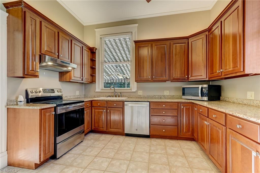 521 Patrick Street Eden, NC 27288 - Photo 26 of 50 Modern updated kitchen with stainless steel appliances and granite countertops