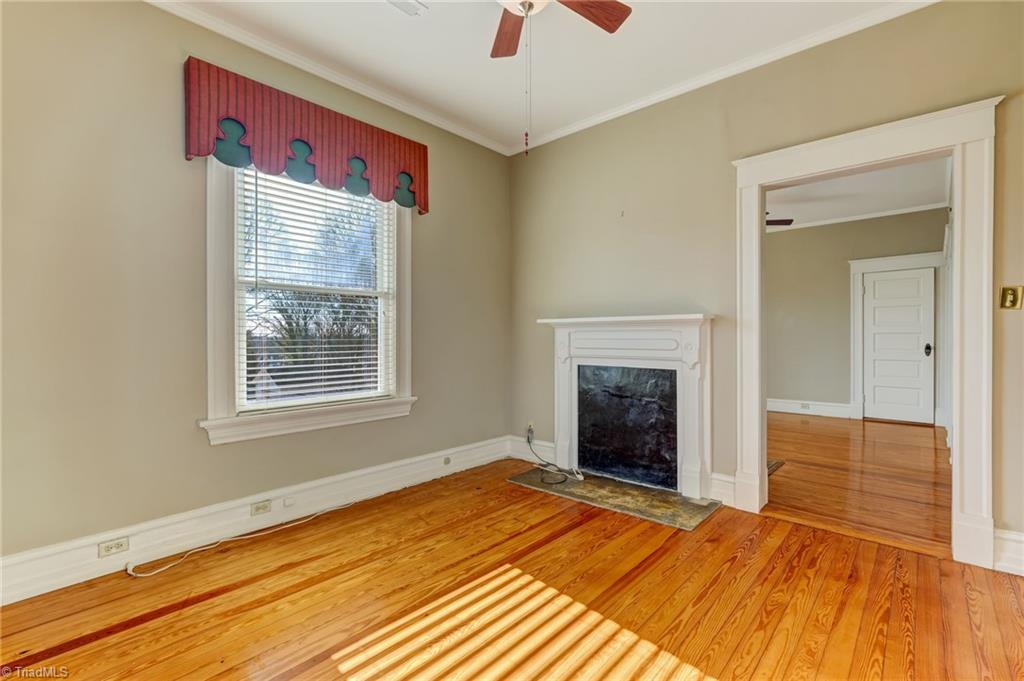 521 Patrick Street Eden, NC 27288 - Photo 39 of 50 Sitting room off Primary bedroom with fireplace